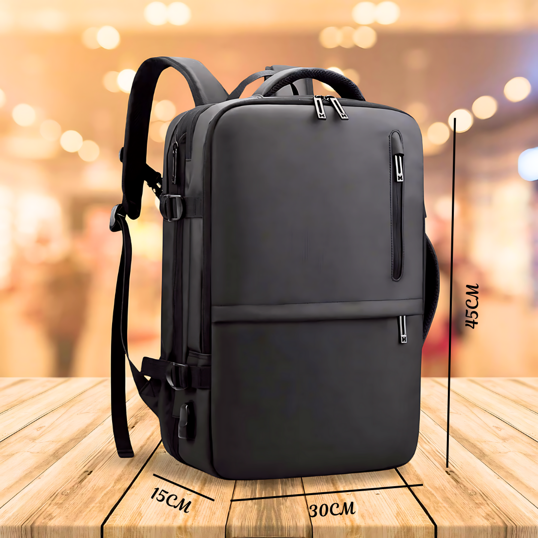 Business backpack with laptop and luggage compartment, USB port, and strap pocket