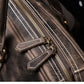 Top view of dark coffee color leather duffel bag showing stitching detail and zipper